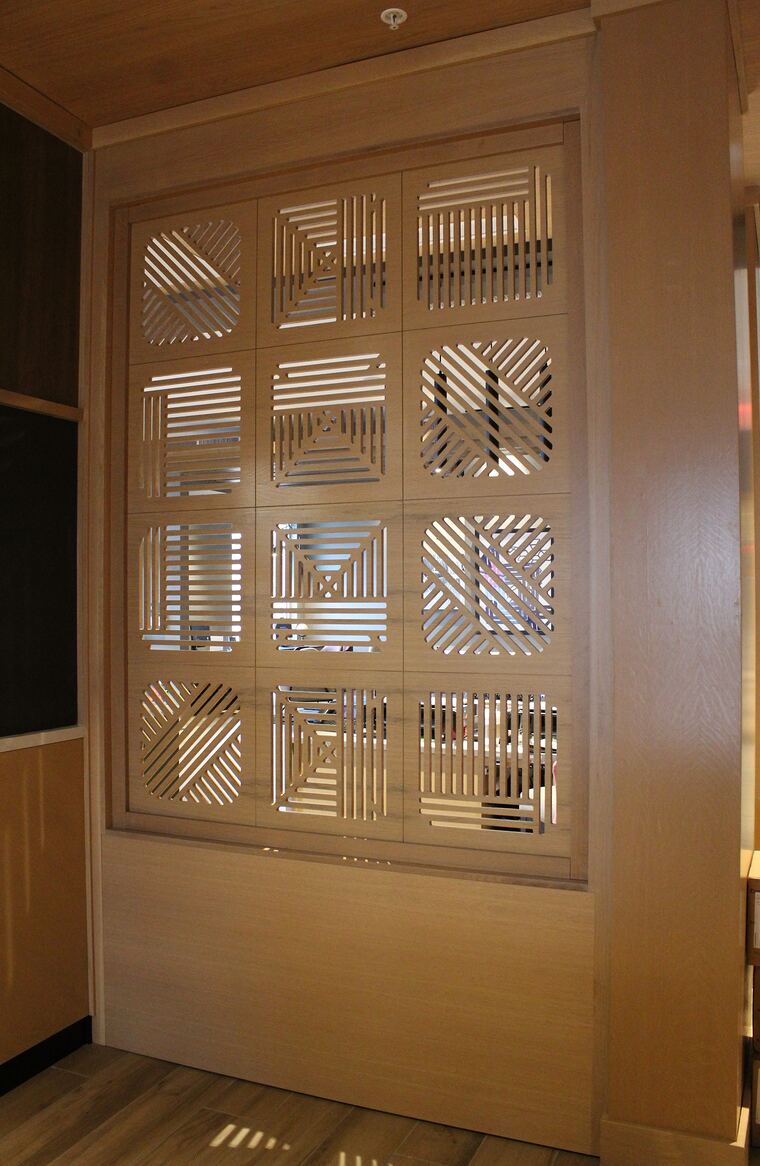 Backlit laser-cut wood partition