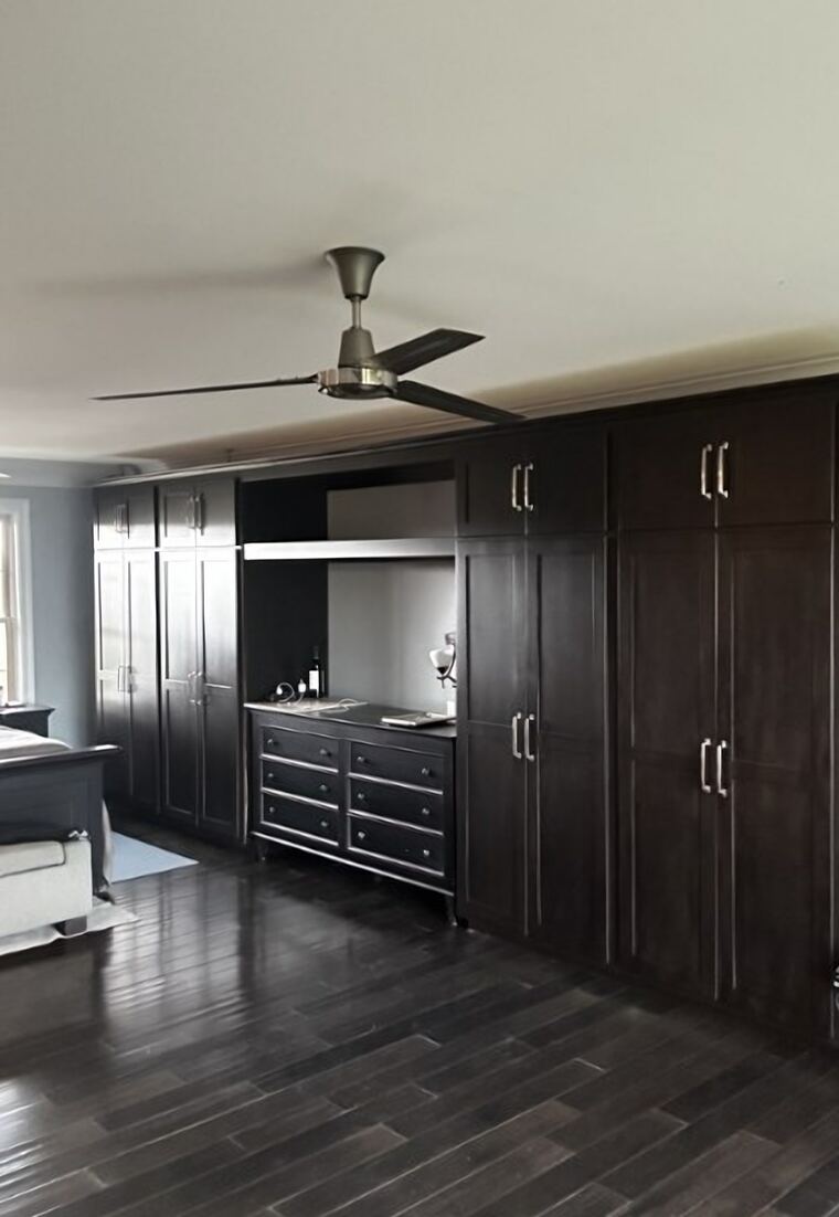 Bedroom wardrobe wall built in around a dresser niche