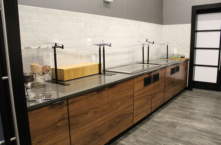 Breakfast servery with walnut cabinetry