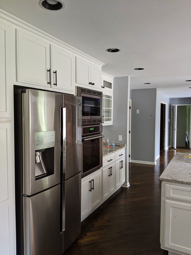 Bright kitchen with a full-height cabinet run and drawer bank