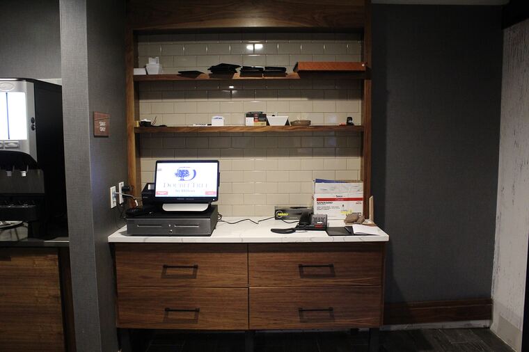 Coffee station with lit tile display