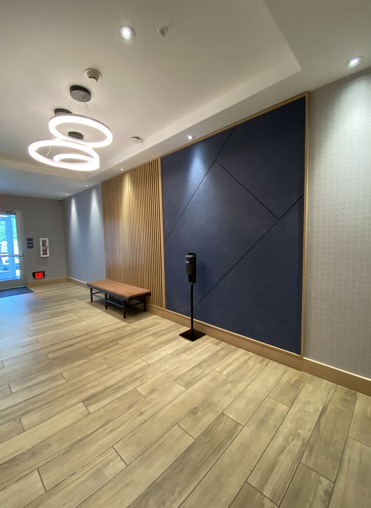 Commercial lounge with wood and accent wall