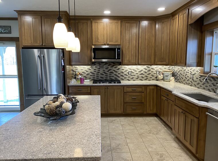 Maple kitchen with a stone-topped island