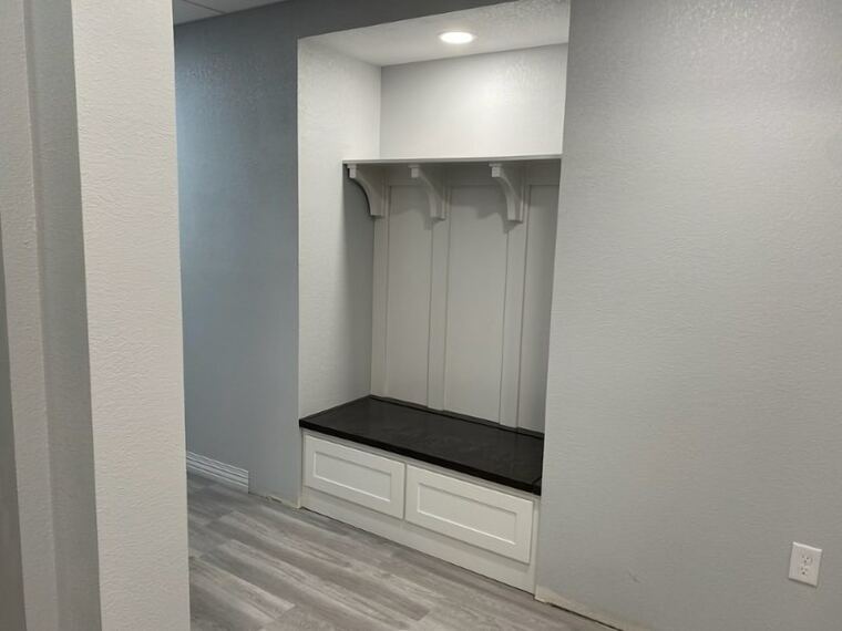 Mudroom bench seat with storage drawers and panelized back